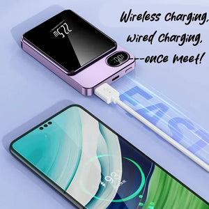 A portable charger attaches to the back of the phone with a magnet