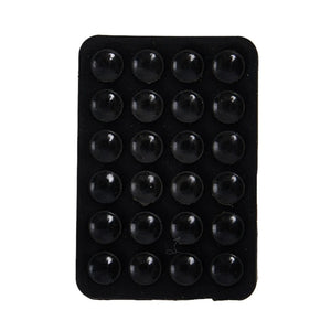 A sticky and multi-purpose grip pad, designed to hold your mobile phone securely on different surfaces.